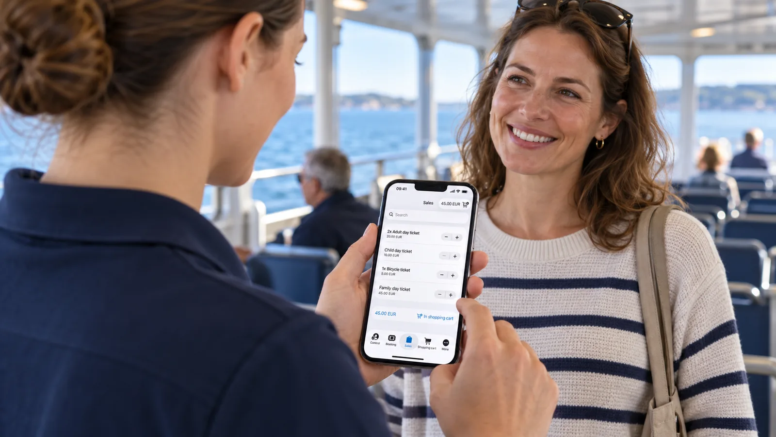Illustrative crew member using a ticket app with a passenger onboard