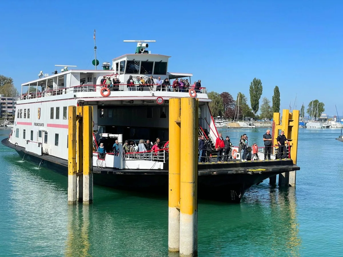 Passenger and vehicle ferry at its terminal