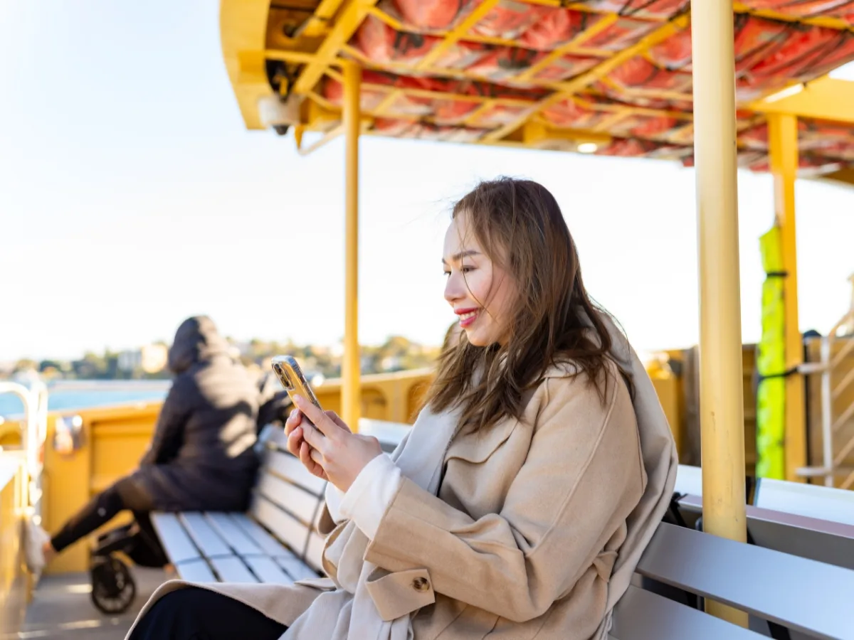 Passenger checking a journey on a smartphone