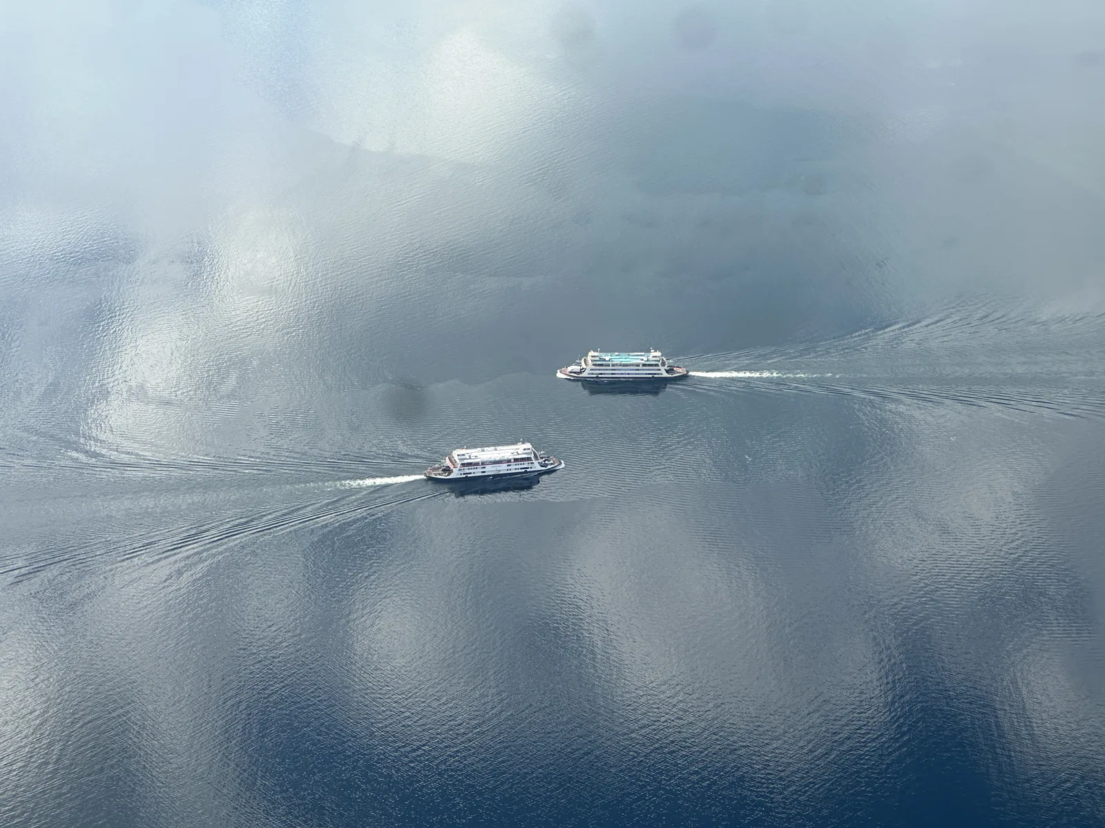 Aerial view of two ferries underway